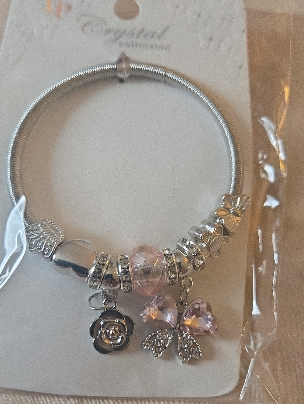 Silver Tone Bling Pink Charm Bracelet With Heart Bow Charm